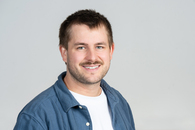 Portraitfoto des neuen Mitarbeiters, ein Mann mittleren Alters mit braunen kurzen Haaren.